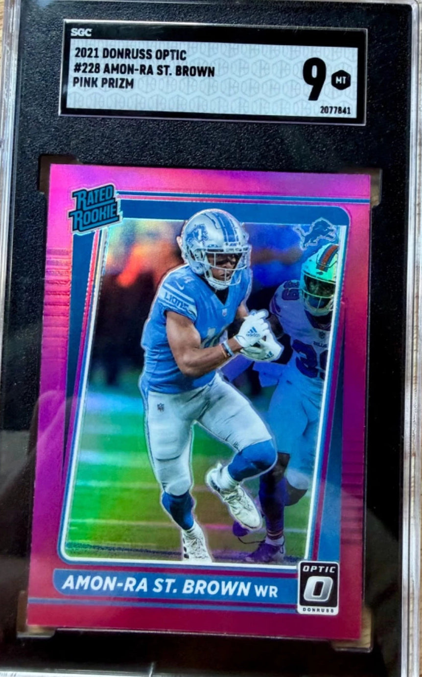 2021 Panini Donruss Optic - Rated Rookie Amon-Ra St. Brown #228 Pink Prizm Graded (SGC 9.5)