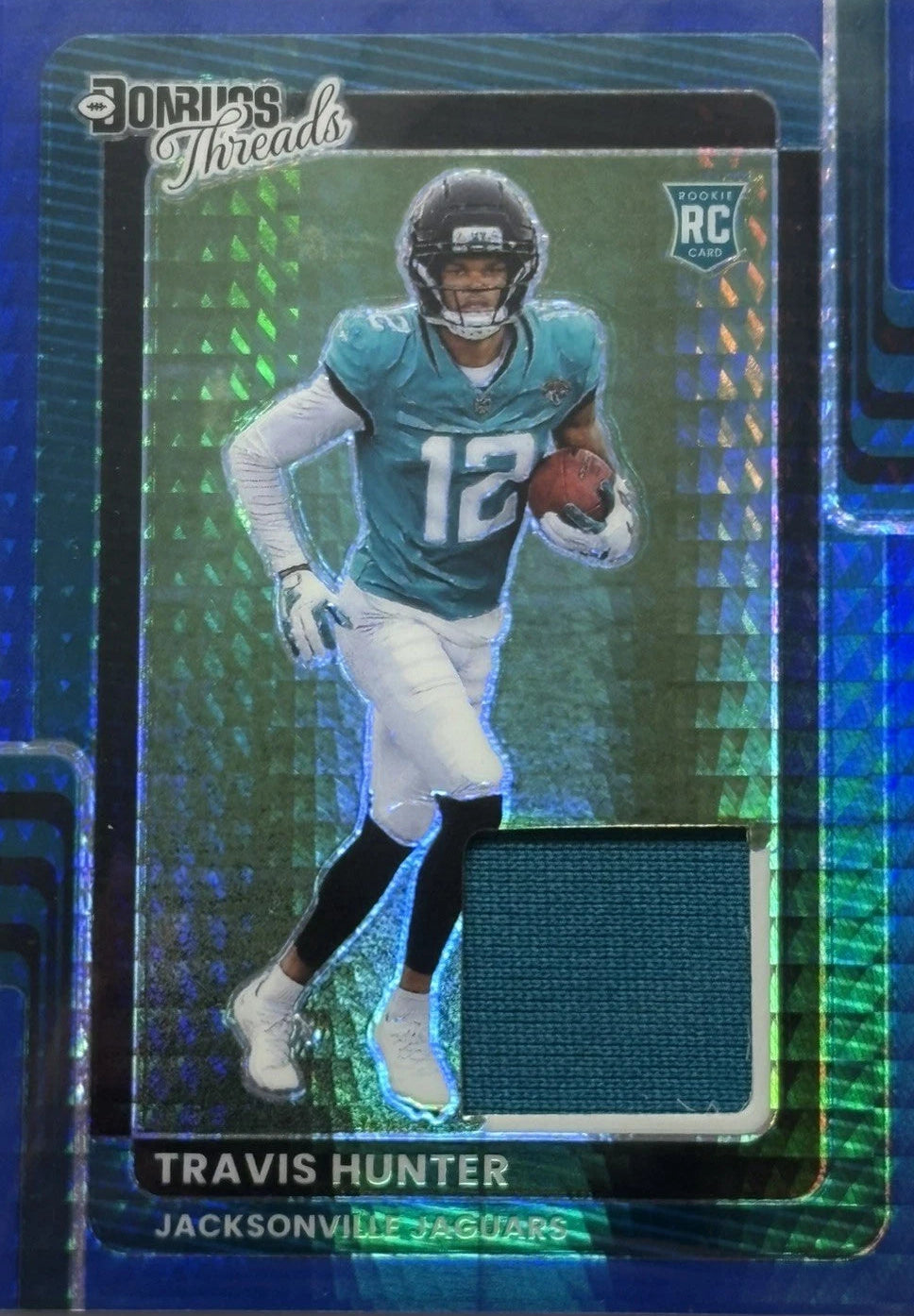 2025 Donruss Travis Hunter RC Blue Hyper Prizm Threads Rookie DTBH-THR Jaguars
